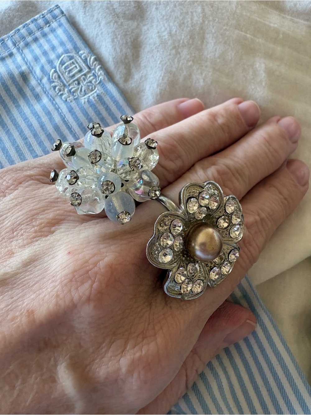 Set of two rings made from vintage clip earrings. Size adjustable.